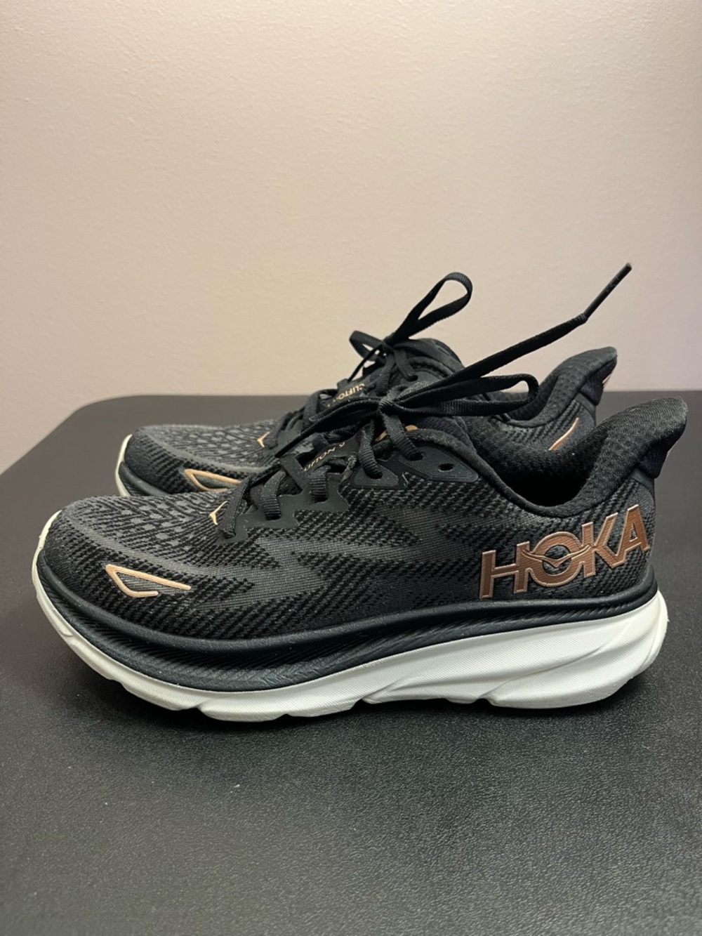 Hoka Black with Rose Gold Logo Running Sneakers: Clifton 9
